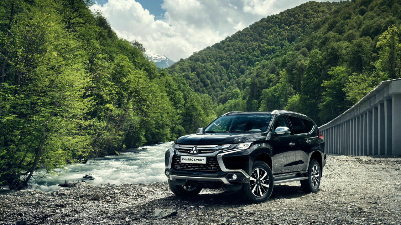 Тест-драйв Mitsubishi Pajero Sport: гламурные игры на бездорожье -  АвтоВзгляд